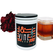 Load image into Gallery viewer, KCMOCO. 18th &amp; Vine Candle in KC Collection Jar: White glass jar with photo label with photo of 18th &amp; Vine neon sign, with black bamboo lid. Glass of whiskey and flowers in background.

