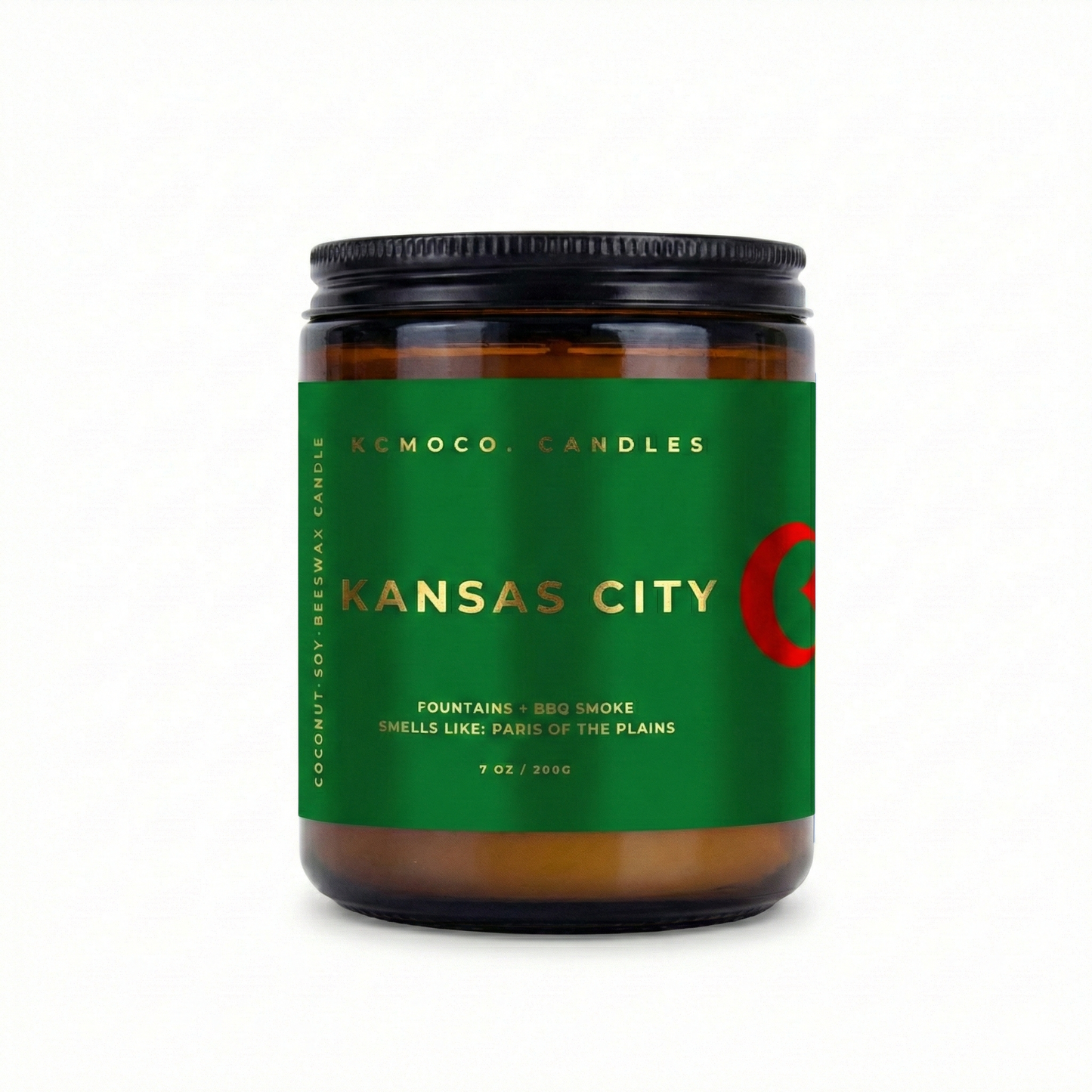 green gold and red Algeria Flag inspired label on candle reading "Kansas City" with black lid on white background