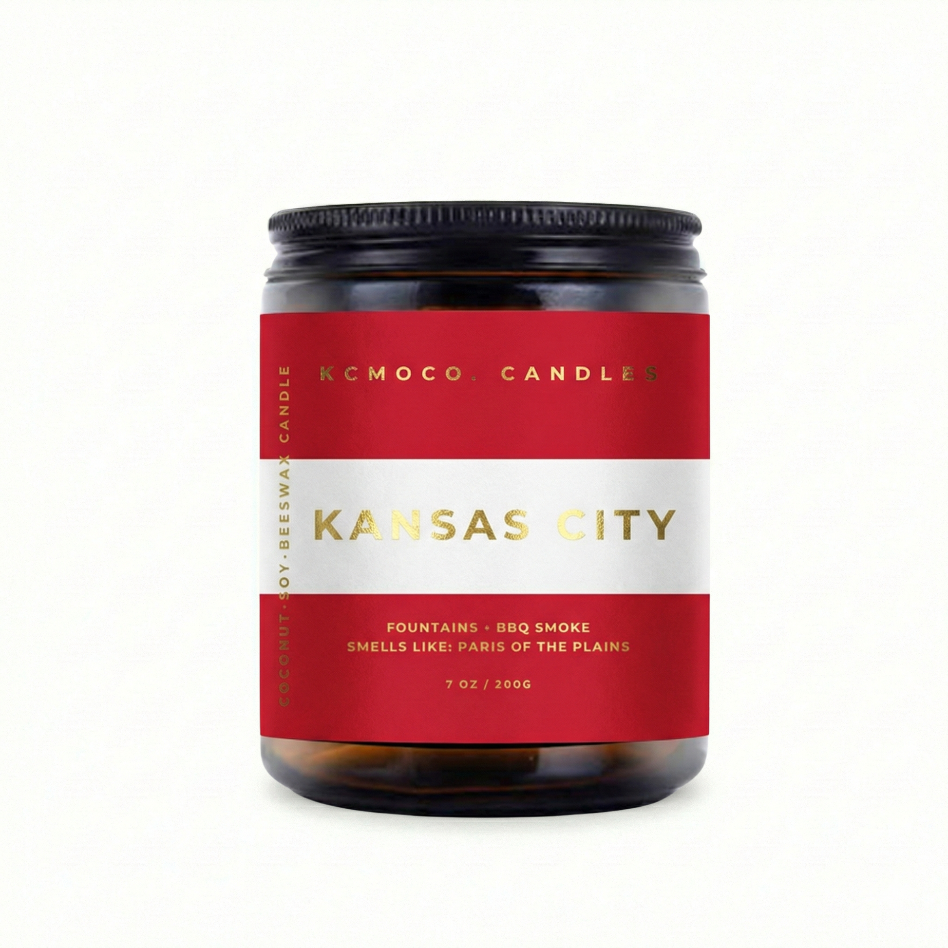 red white and gold Austrian Flag inspired label on candle reading "Kansas City" with black lid on white background
