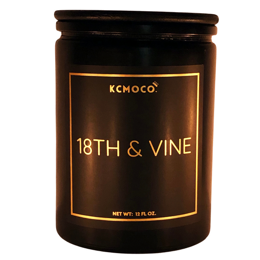 KCMOCO. Candles 18th & Vine Candle in Classic Collection Jar: Black glass jar with gold foil label reading "KCMOCO. 18th & Vine", with black bamboo lid.